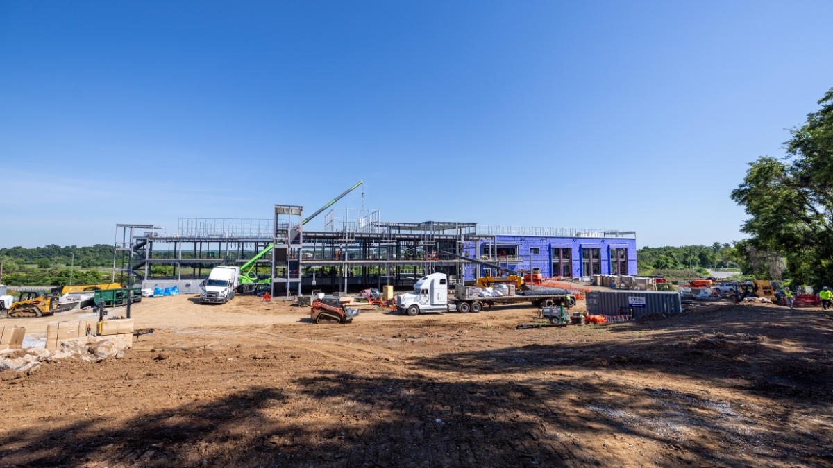 Wide view of a multistory commercial building under construction