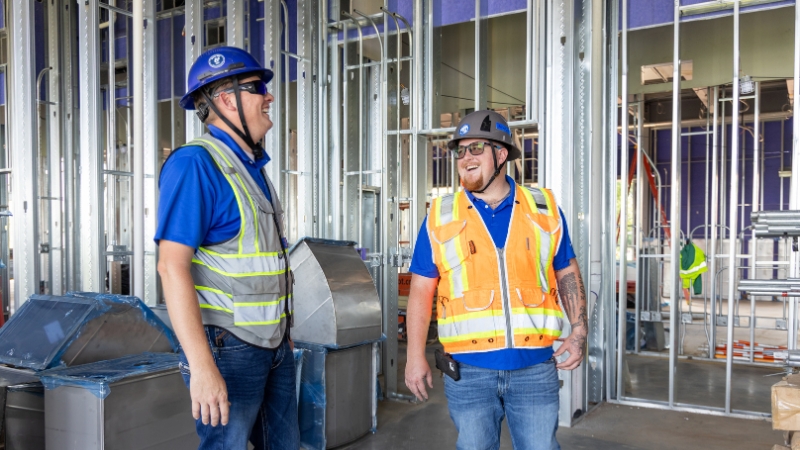 two commercial electricians on commercial jobsite
