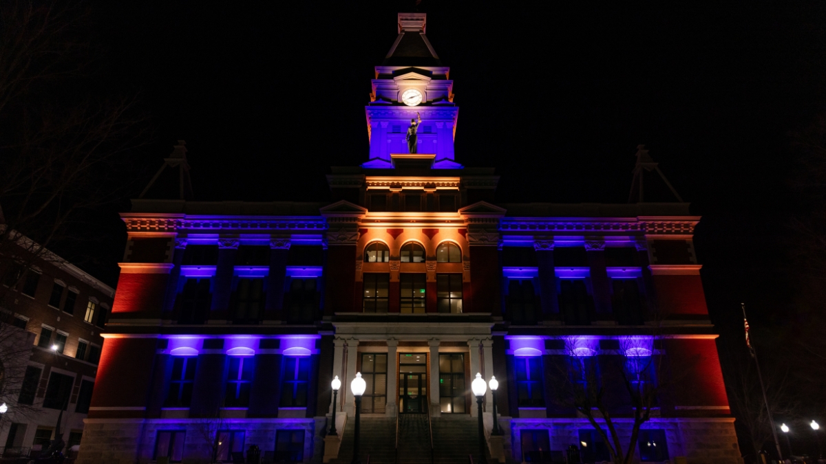 Montgomery County Courthouse illuminated in blue at night